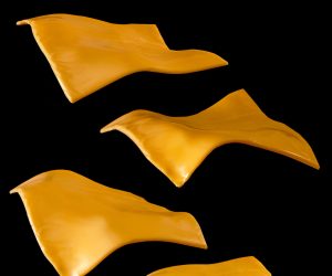 Peaces,Of,Yellow,Cheese,Flying,On,A,Black,Background