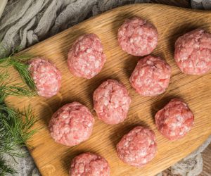 Raw,Meatballs,On,The,Wooden,Cutting,Board.,Small,Depth,Of